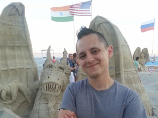 I'm not sure if Dave Rine would want me to tell you whether or not he's responsible for the sand sculpture behind him.